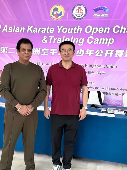 With my friend Mr. Zhang Zhi, President of the Chinese Karate Federation, at the AKF Youth Open Championship and Training Camp.