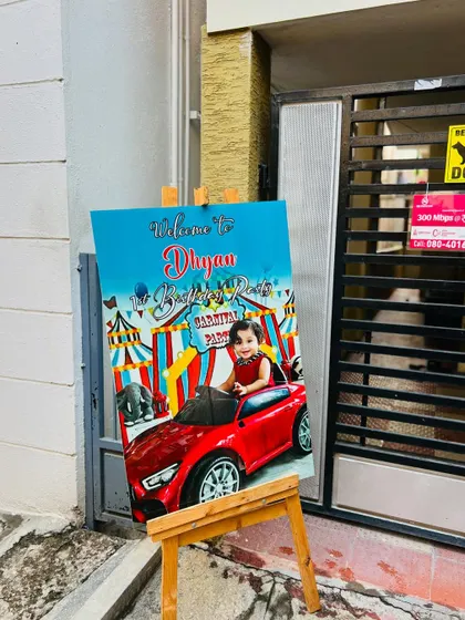 A custom welcome sign for a carnival themed birthday party. This personalized easel sign greets guests at the entrance and sets the stage for a fun-filled event.