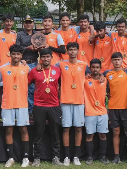 The team celebrates with the trophy after winning the Soccer Kodai Open 2024. This victory is a testament to their hard work and our effective training program.
