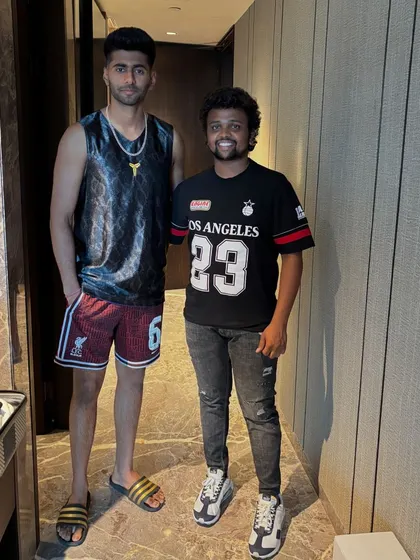 Standing with Mayank Yadav, a future star.