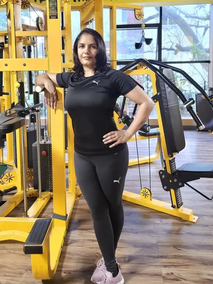 The 'after' photo of a complete health overhaul. This client is now stronger, leaner, and free from the metabolic issues that were holding her back.