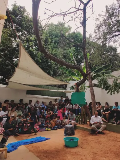 A wide view of our school community, with parents and friends gathered to watch the children's theatrical performance.