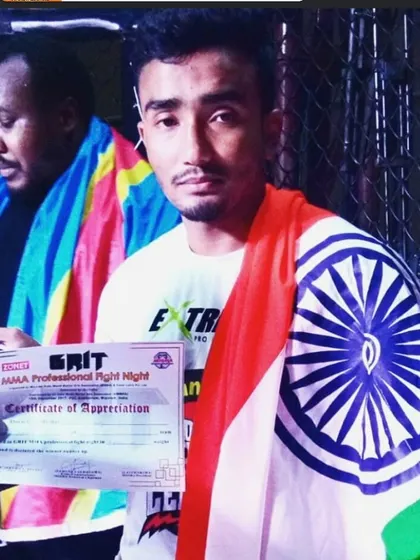 Happy Independence Day. A photo of one of our fighters proudly representing India after a win abroad. This is what we fight for.