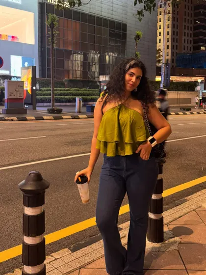 Just me, my bubble tea, and the city lights of Kuala Lumpur. A casual night-out look.