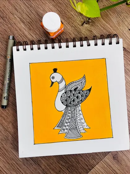 A Madhubani-style peacock, drawn with intricate zentangle-like patterns. The bold yellow background makes the black and white design stand out.