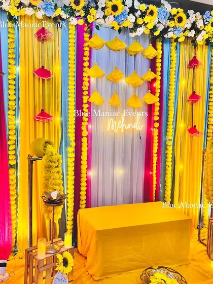 Another angle of the compact Mehendi setup, showing the arrangement of props and lighting that bring the space to life.