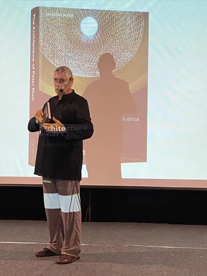 Architect Peter Rich delivering an inspiring talk about his journey in architecture.