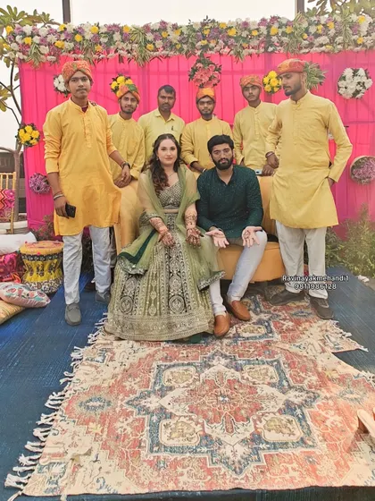 A group photo with the happy couple and our team of artists. We are proud to provide our services for such important life events.