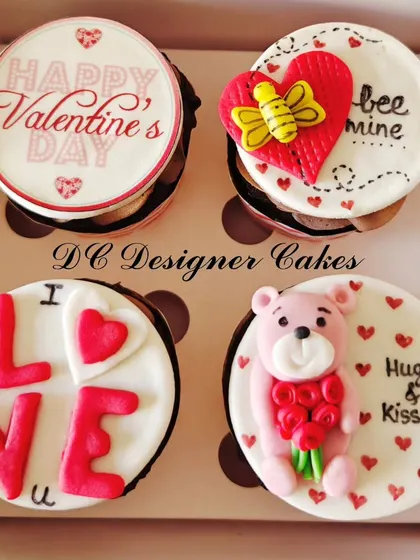 A sweet and simple gift box for Valentine's Day. This set of four cupcakes includes custom toppers with messages like "Bee Mine," "I Love U," and a cute teddy bear.
