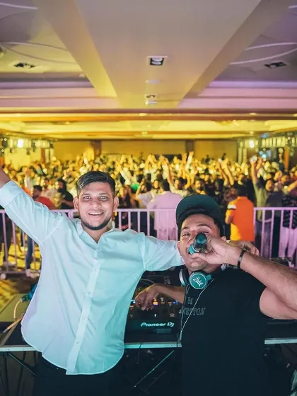 Celebrating on stage with a fellow DJ at the Taj MG Road NYE party. Collaborating with other talented artists always brings a unique energy to the event.