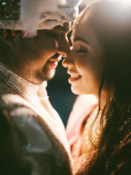 The purest joy is found in the in-between moments. This close-up captures the uninhibited smiles and gentle connection that define a relationship, bathed in a soft, romantic light that feels both intimate and cinematic.