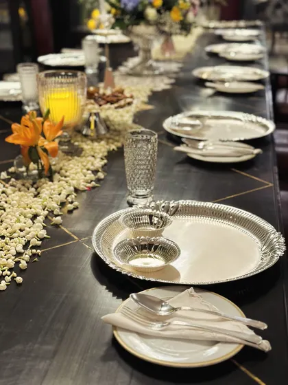 An exquisite table setting featuring premium silverware from Rezon Luxury Silverware, highlighting our collaboration with other luxury vendors to create a complete high-end experience.