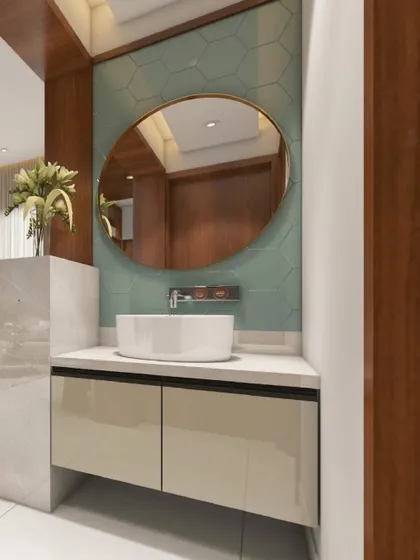 Tradition finds its rhythm in modern comfort. This image showcases a sleek vanity with a round mirror against a backdrop of hexagonal tiles, blending soul and sophistication.