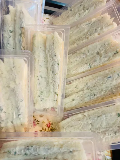 My chicken mayo sandwiches are packed in clear containers, showing the fresh, creamy filling. They are perfect for iftar gatherings or any casual event.