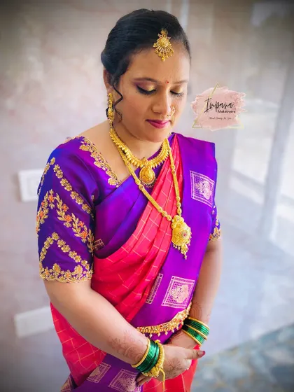 Another angle of this beautiful traditional look, showcasing the intricate details of her blouse and jewellery.