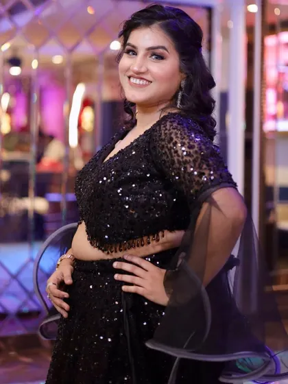 Another shot of her smiling, showing how the makeup looks great from every angle.