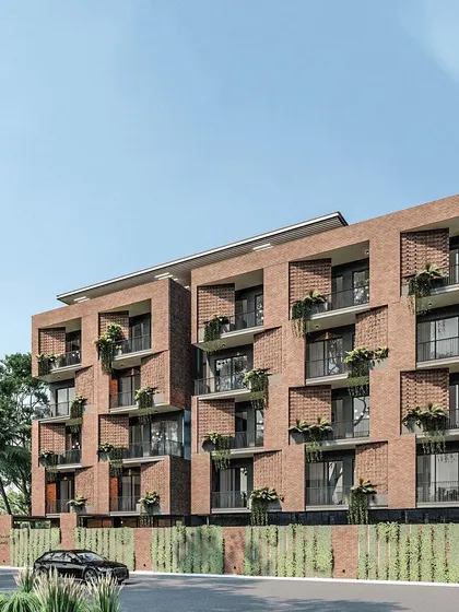 Exterior renderings of Nandi Souls, a boutique weekend home concept near Bangalore, featuring a distinctive brick facade with integrated planters for a green, living exterior.