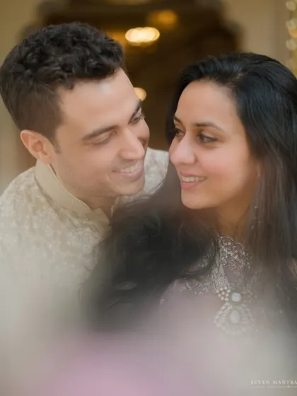 The way they look at each other tells the whole story. This close-up is all about the emotion and connection shared between Vibha and Roger.