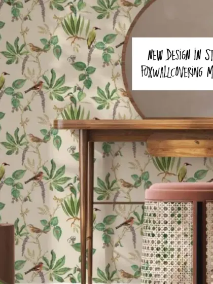 This charming wallpaper features birds perched on winding vines. It's a classic and timeless design that adds a touch of nature and elegance to any room.