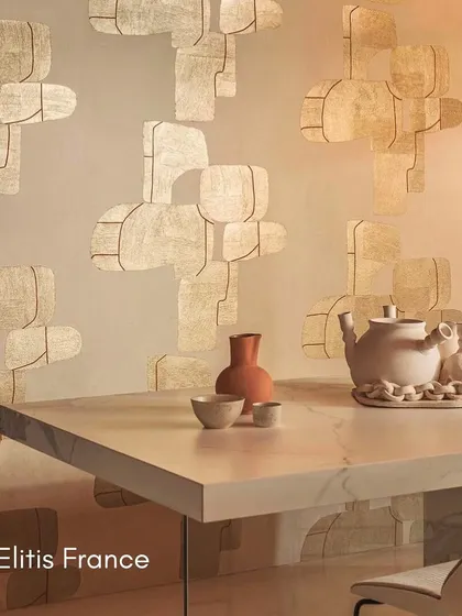 This wallcovering from Élitis France features abstract, floating shapes made of Hanji paper. The design redefines your space, blending art and function to create an atmosphere of elegance and inspiration.
