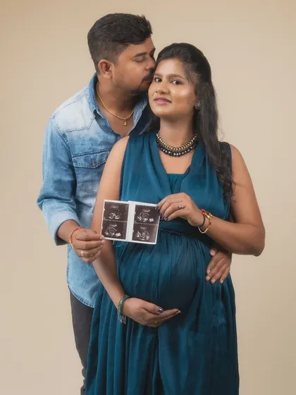 A little glimpse of their future held in their hands. This portrait, featuring the baby's first sonogram, is a beautiful and tangible reminder of the miracle they are waiting to meet.