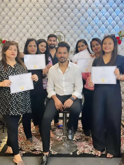 A group photo with my certified students after a successful batch. Ready to create amazing hairstyles.