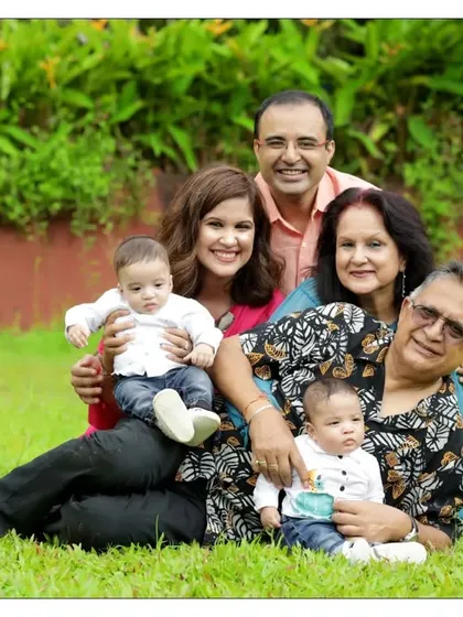 Capturing multiple generations in one frame is truly special. This outdoor portrait includes grandparents, parents, and the newest additions to the family, creating a priceless heirloom.