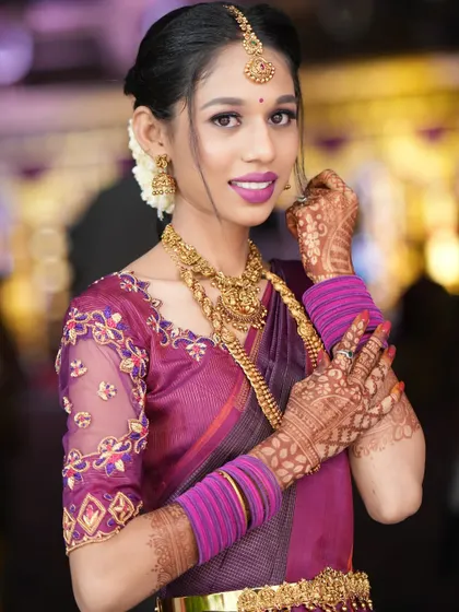A simple and elegant makeover. This bride's happy expression shows her confidence in the final look.