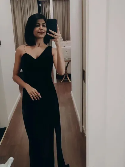 A classic black one-shoulder gown for an unforgettable corporate event. Simple, elegant, and professional.