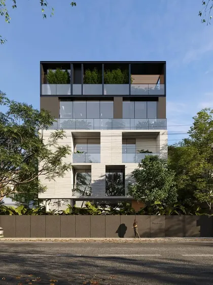 This house is designed to be both extroverted and introverted. The facade engages with the urban fabric, while a central spine and backyard create private, inward looking spaces for the family.