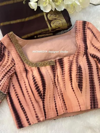 The front of the tie-dye sleeve blouse, showing its modern and chic design.