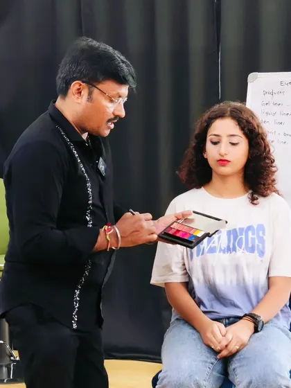 A close-up of me demonstrating color theory during our 5-day upskill course in Bangalore. I ensure every student understands how to choose and blend colors for a vibrant look.