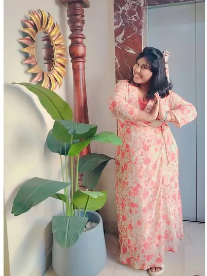 A casual pose in a beautiful floral wrap dress. This photo shows my everyday style, which is comfortable, cheerful, and expressive.