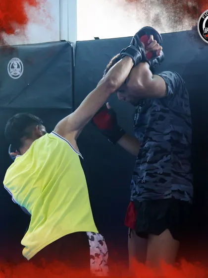 An intense training moment between two members of the national team. The level of sparring is world-class, pushing everyone in the gym to be better.