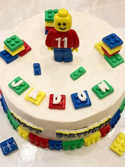 This version of the Lego cake features the birthday boy's name spelled out in fondant blocks on top.