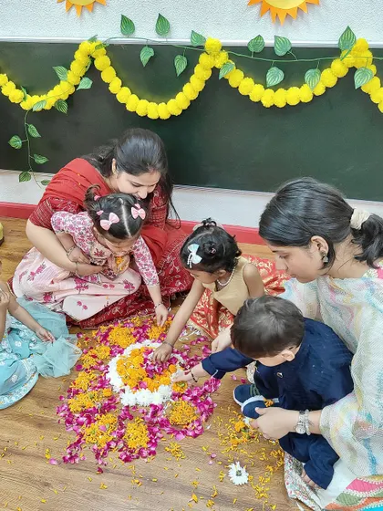 Little hands coming together to create a vibrant flower rangoli. Our Diwali celebration is a collaborative and creative experience for the children and teachers.