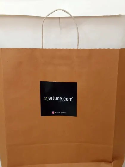 Every corporate gift is professionally packaged. Here is the pirate-themed caricature ready to be presented in our branded bag.