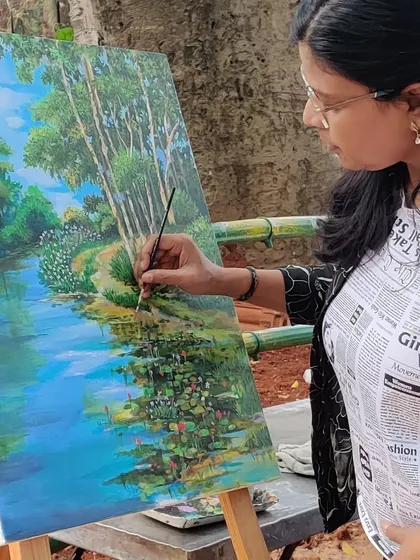 Adding the final touches to the water reflections in my painting.