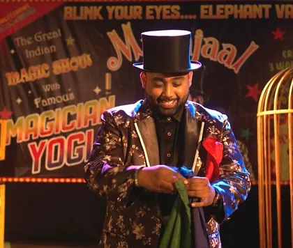 Preparing for a colorful silk handkerchief trick on the set of 'Loot Kaand'. It was my job to ensure all the magic looked convincing on screen.