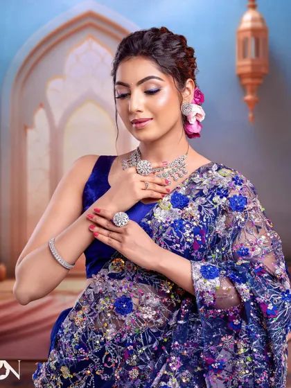 A close-up of the model, her makeup and CZ jewellery perfectly in sync. This look is all about understated elegance and modern glamour.