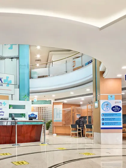 Hospital reception lobbies are a critical first point of contact. We design these spaces as spatial anchors and emotional reset points, using double-height atriums and clear sightlines to reduce stress and restore a sense of orientation.