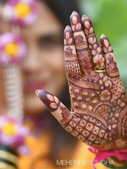 This artistic shot highlights the beautiful leaf patterns on the fingers, with the stain looking exceptionally dark.