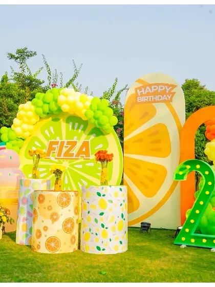 A wider view of the 'Two-tti Fruity' photo zone, showing how all the different props and backdrops come together to create a cohesive and picture-perfect setting.