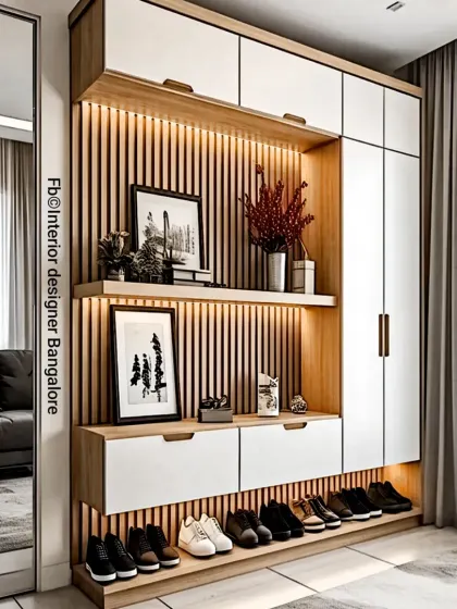 An entryway should be both welcoming and practical. This foyer unit features a backlit fluted panel, open shelves for decor, and a dedicated, well-lit space for shoes, blending style with everyday utility.