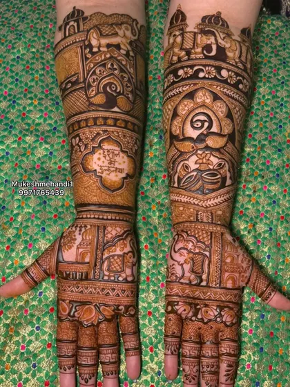 A classic Rajasthani design with elephants, palaces, and a mantra written on the arm for blessings.