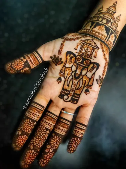As an artist from Karnataka, celebrating our culture is special to me. This design for Mysuru Dasara features the iconic Jamboo Savari elephant and the Mysore Palace, bringing the spirit of the festival to life through henna.