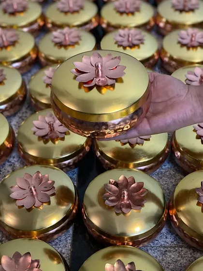 Crafting these golden lotus boxes for an Arangetram was a special honor. It’s a joy to create favors that respect deep cultural traditions while adding a touch of luxury, especially when they travel across the world to be part of a milestone.