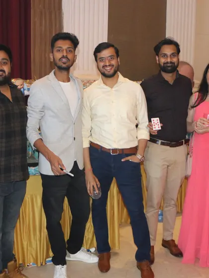 Posing with guests after a performance at an annual company party. My goal is to leave everyone with a smile and a great memory of the event.