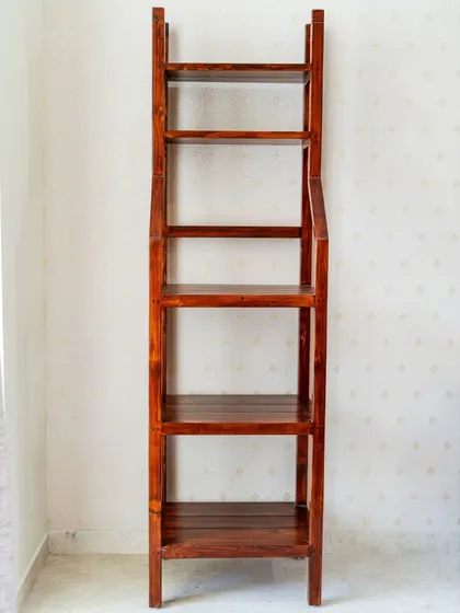 The étagère shelf shown empty, highlighting its unique, leaning design.