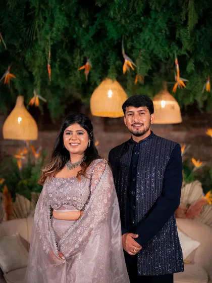 A candid moment of laughter between Yeshaswini and Shashank. We designed a boho-chic backdrop with cane lanterns and birds of paradise that perfectly matched their relaxed and happy vibe.